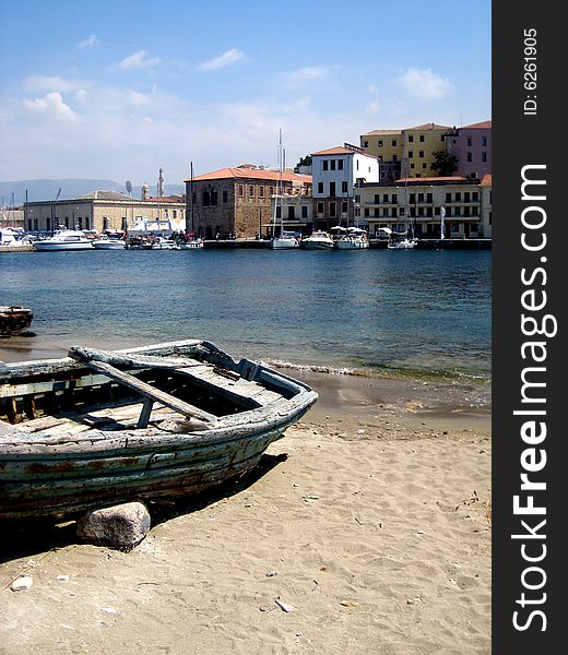 This is an old wooden boat at the old harbor in Chania, Crete. This is an old wooden boat at the old harbor in Chania, Crete.