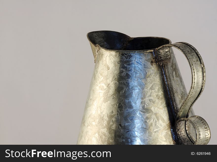 Antique tin pitcher