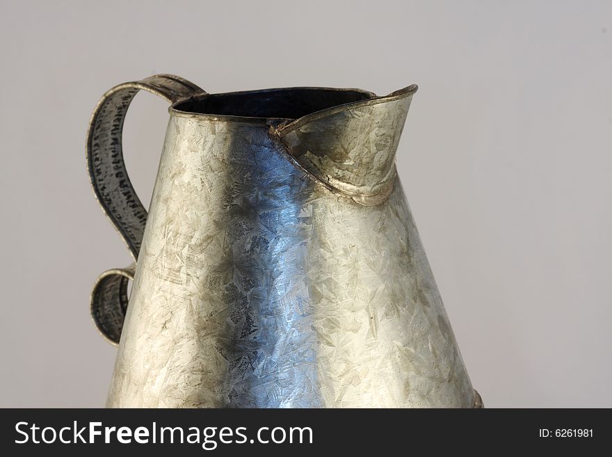 Antique tin pitcher