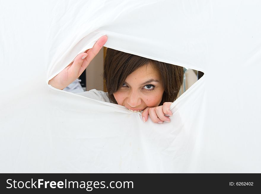 Opening white canvas. Attractive girl over white background.