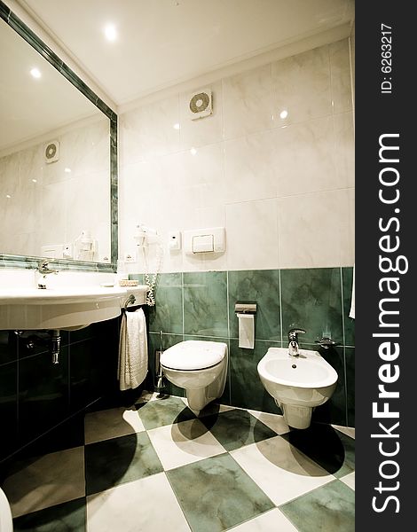 An hotel green luxury bathroom