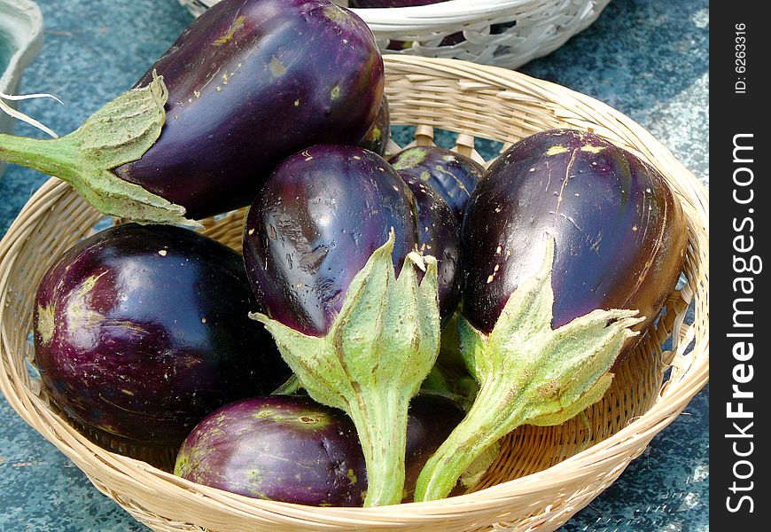 Eggplants on display at a farmer's market