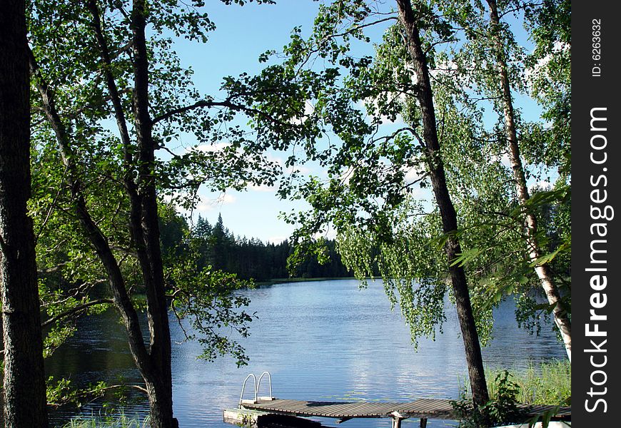 Wharf in a lake in Finland. Wharf in a lake in Finland