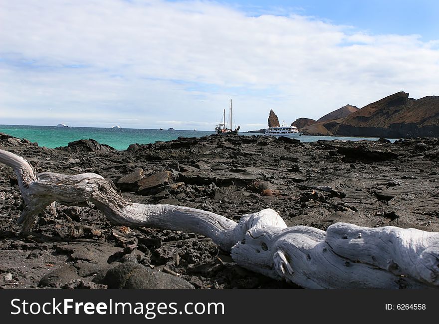 Cruise ships await passengers off the coast of the Galapagos Islands. Cruise ships await passengers off the coast of the Galapagos Islands