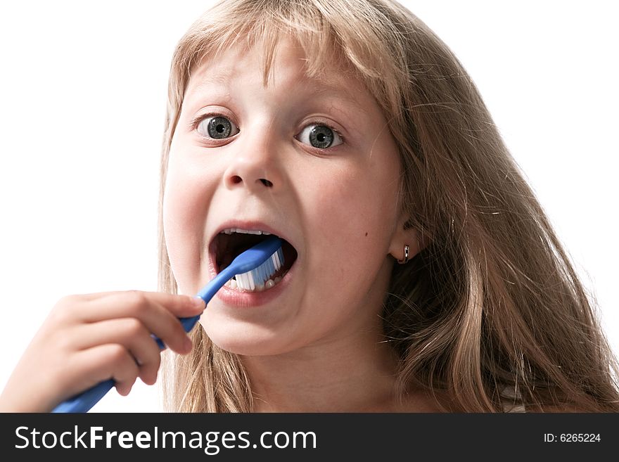 Little girl with toothbrush on neutral background. Little girl with toothbrush on neutral background