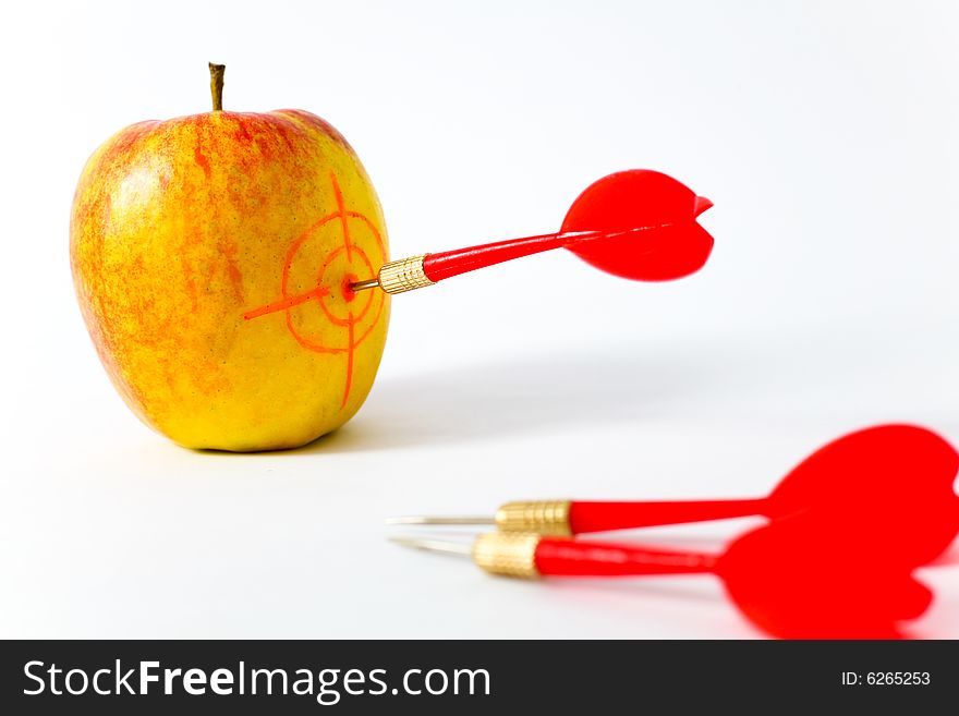 Red-yellow apple with darts