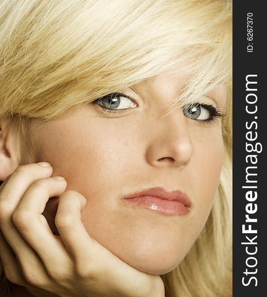 A portrait of a young attractive blond Caucasian woman. A portrait of a young attractive blond Caucasian woman.