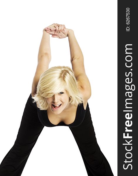 Young attractive blond Caucasian woman in black working out on white background. Young attractive blond Caucasian woman in black working out on white background.