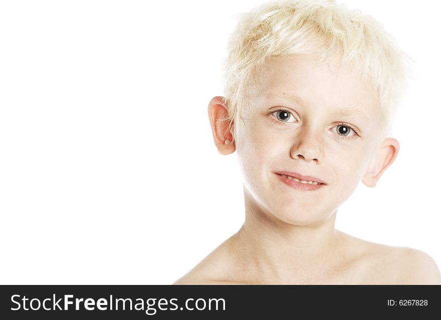 Portrait of a young blond Caucasian boy (4-7) on white background. Portrait of a young blond Caucasian boy (4-7) on white background.