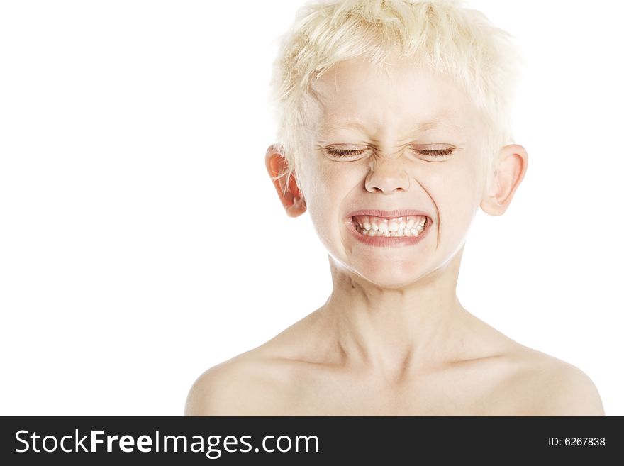 Portrait of a young blond Caucasian boy (4-7) on white background. Portrait of a young blond Caucasian boy (4-7) on white background.