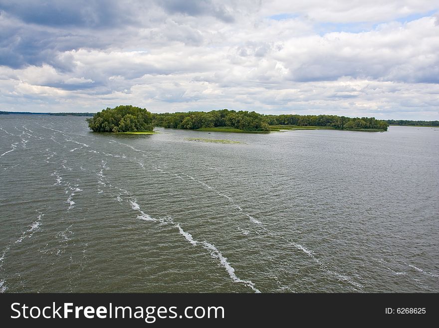 Island on big Ukrainian river Dniepr's before thunderstorm. Island on big Ukrainian river Dniepr's before thunderstorm