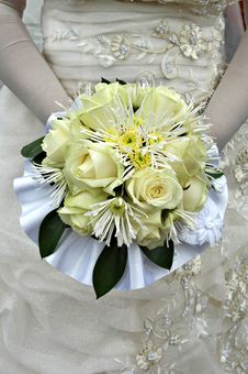 Bride Holding Yellow Bouquet Stock Image
