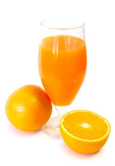 Orange Juice In Glass And Oranges. Stock Images Orange Juice In Glass And Oranges. Stock Images