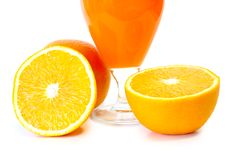Orange Juice In Glass And Oranges. Stock Photo Orange Juice In Glass And Oranges. Stock Photo