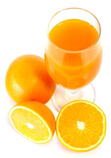 Orange Juice In Glass And Oranges. Royalty Free Stock Images Orange Juice In Glass And Oranges. Royalty Free Stock Images