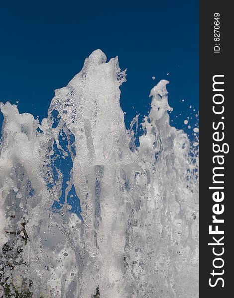 Out door fountain on the blue sky background