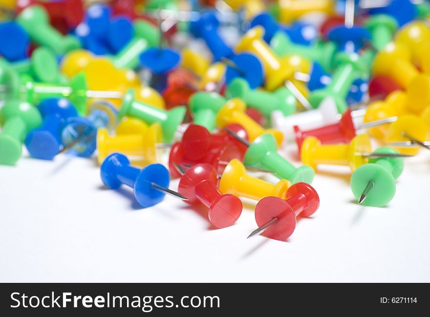 Group of thumb tacks close up