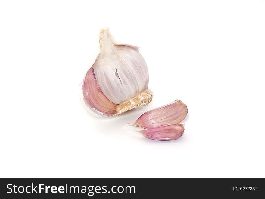 Split garlic isolated on white background