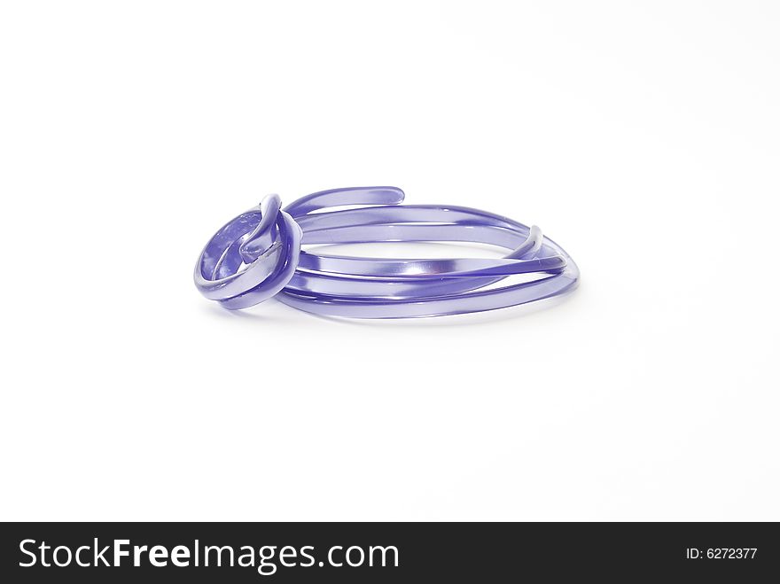 Plastic bracelet and ring, isolated on white background. Plastic bracelet and ring, isolated on white background.