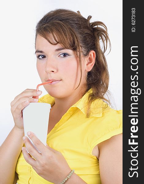 Young woman drinks lemonade isolated on white background