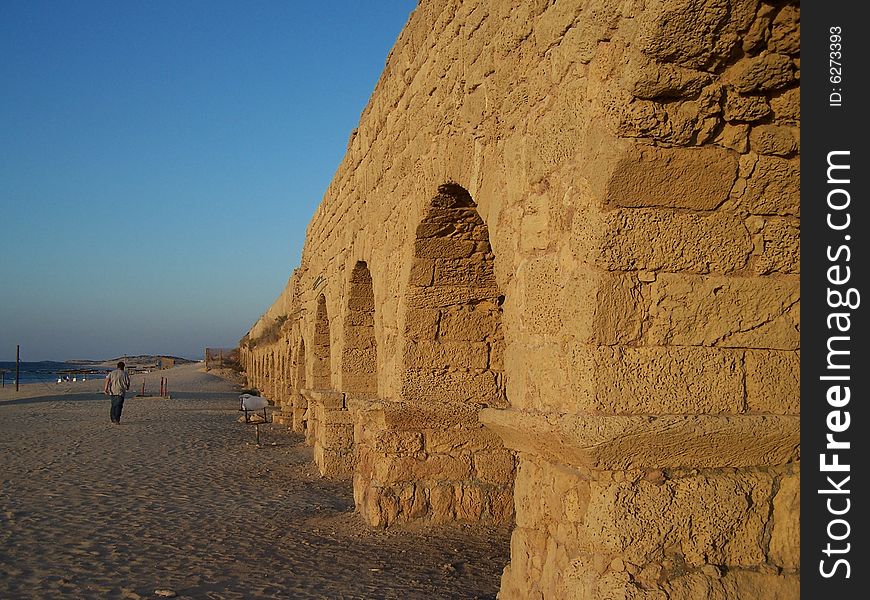 This is a Roman aqueduct built in Israel right on the Mediterranean Sea.