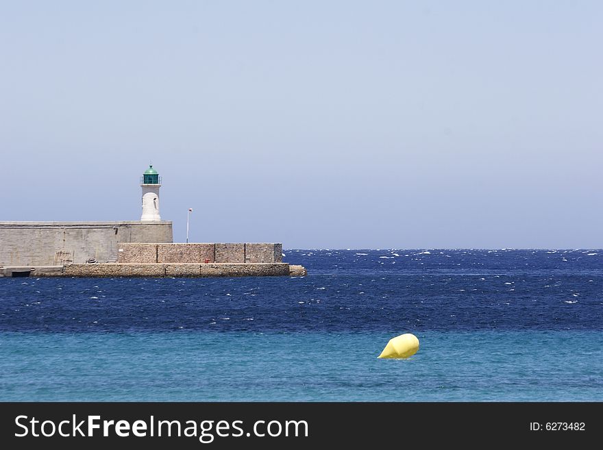 Lighthouse on port entrance to  corsica island. Lighthouse on port entrance to  corsica island