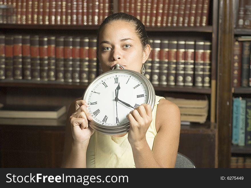 Woman Holding Clock