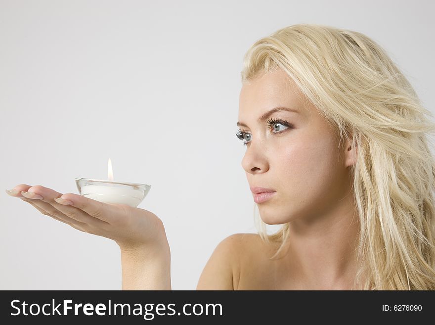 Lady Holding Candle Holder