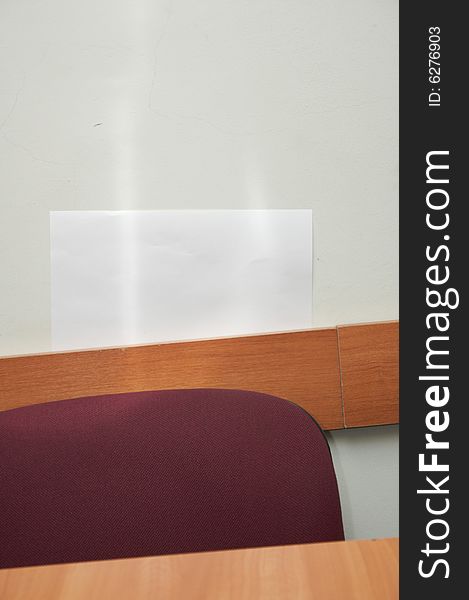 Red chair in classroom interior