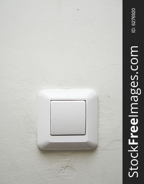 White switch on the wall