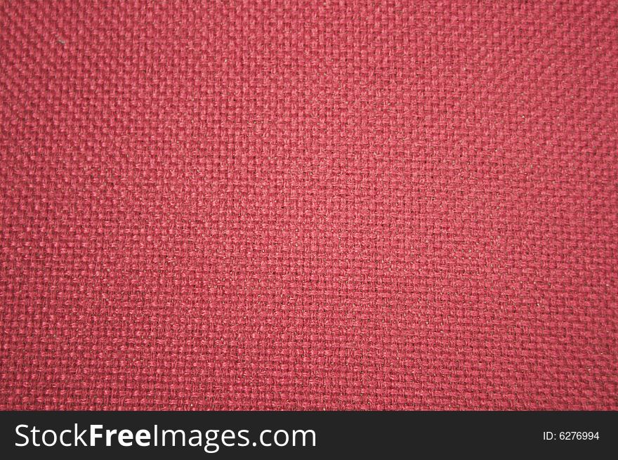 Red rough textile texture can be used as background. Red rough textile texture can be used as background