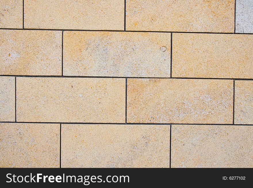 Yellow bricks stone texture can be used as background