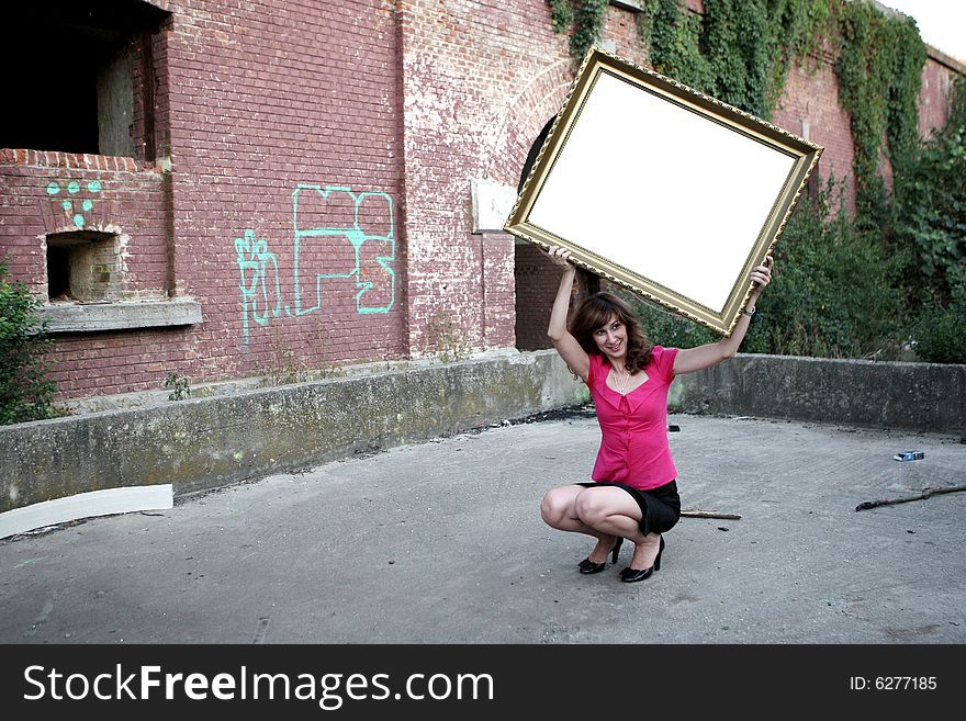 Girl Holding A Frame