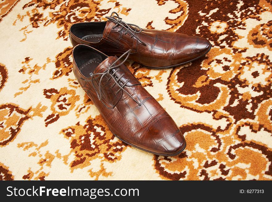 Grooms shoes in his room interior
