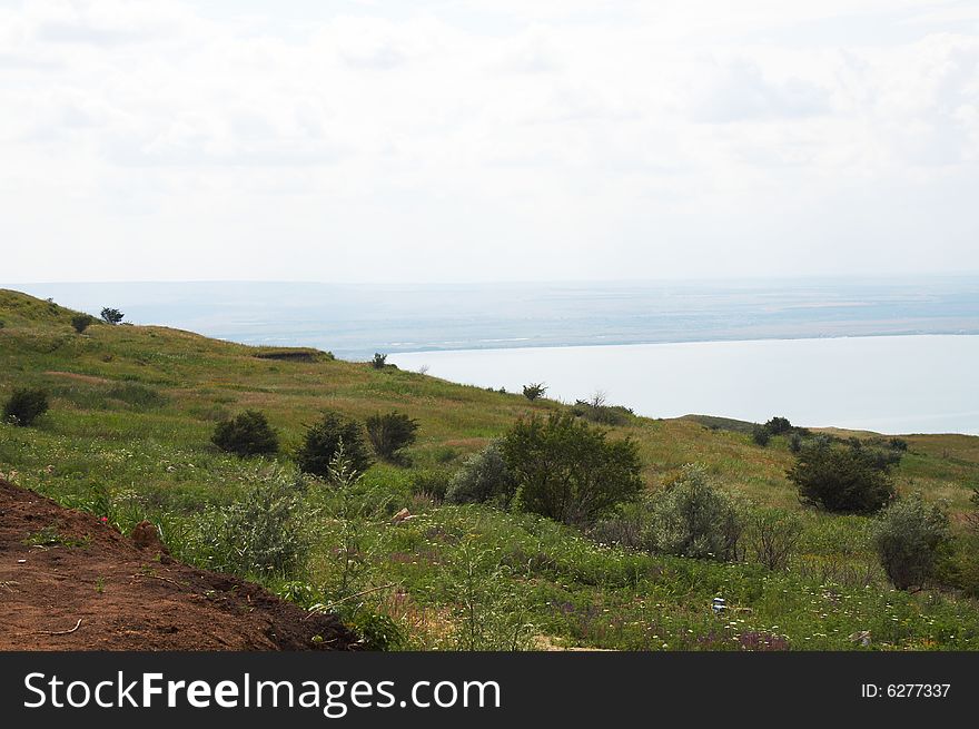 Summer beautiful landscape with lake and sky. Summer beautiful landscape with lake and sky