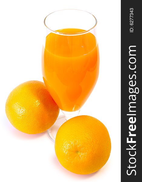 Orange juice in glass and oranges on isolated background. Orange juice in glass and oranges on isolated background.
