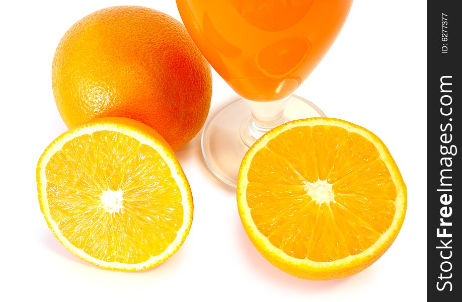 Orange juice in glass and oranges on isolated background. Orange juice in glass and oranges on isolated background.