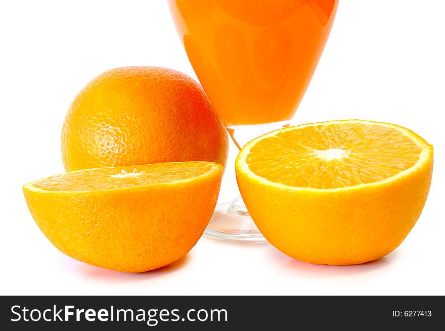 Orange juice in glass and oranges on isolated background. Orange juice in glass and oranges on isolated background.