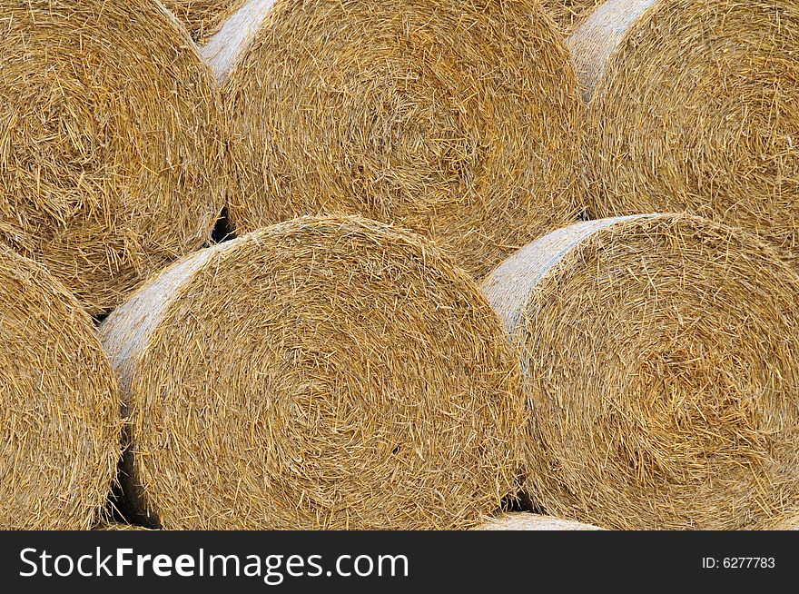 Shot of a pile of haybales,an ideal backround. Shot of a pile of haybales,an ideal backround