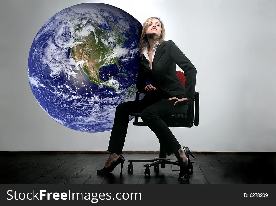 A business woman and a globe