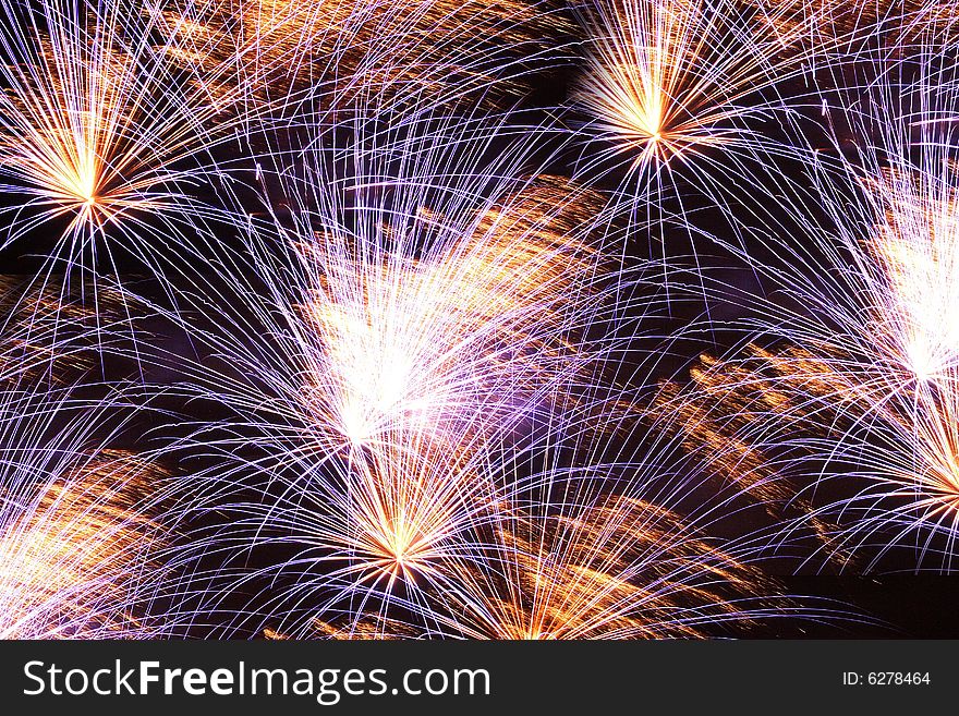 Colourful fireworks on background of dark sky