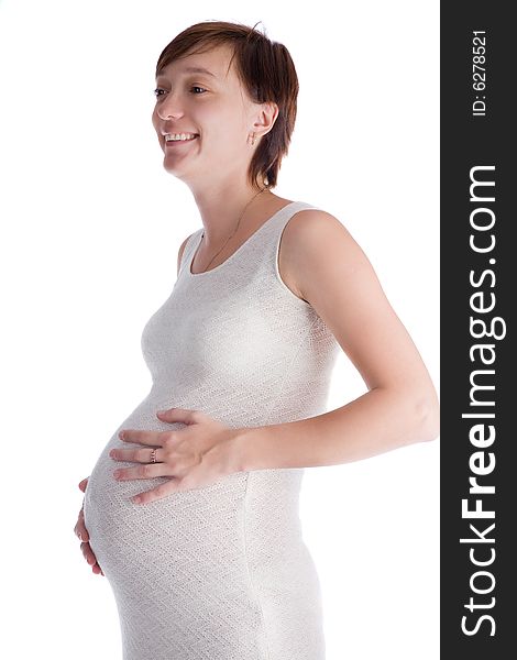 Caucasian woman who is 9 months pregnant on white background. Caucasian woman who is 9 months pregnant on white background