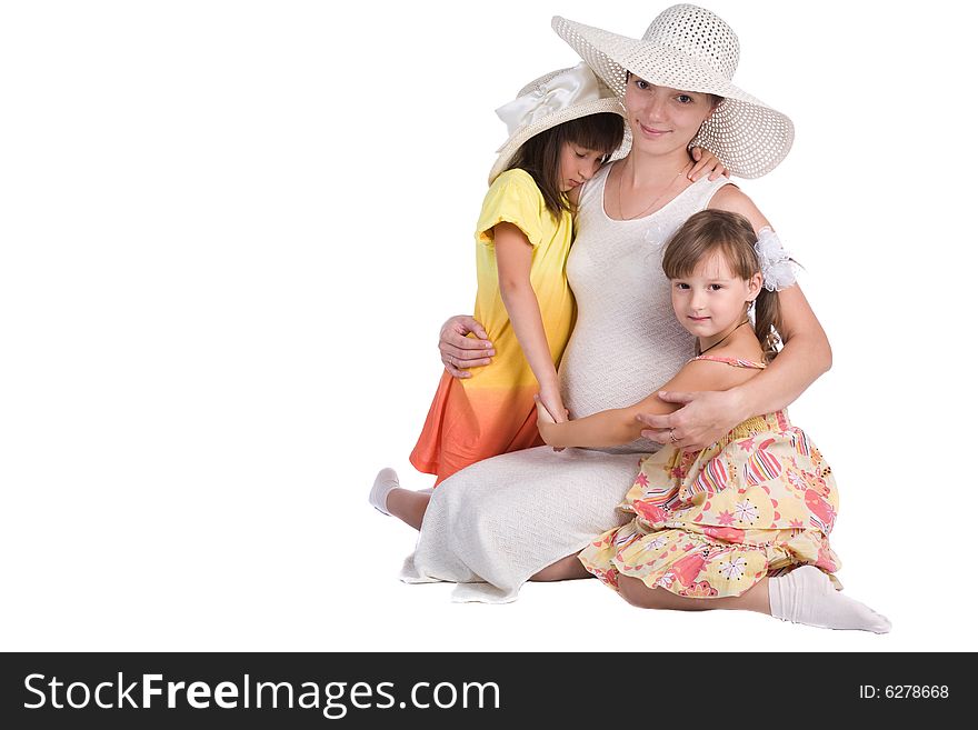 Mother and daughters on the white. Mother and daughters on the white