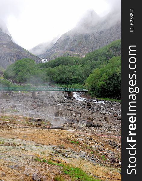 The hot spring near Changbai Waterfall in Changbaishan (Changbai Mountains or Baekdu) in Jilin Province, China. The hot spring near Changbai Waterfall in Changbaishan (Changbai Mountains or Baekdu) in Jilin Province, China.