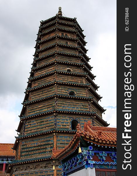 Tower With Monk On Wall