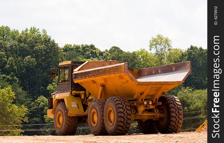 A giant dump truck at a construction project. A giant dump truck at a construction project