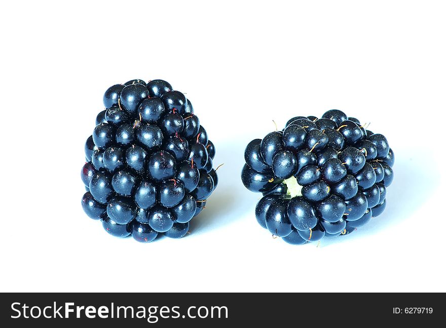 Two of blackberries isolated on white background.