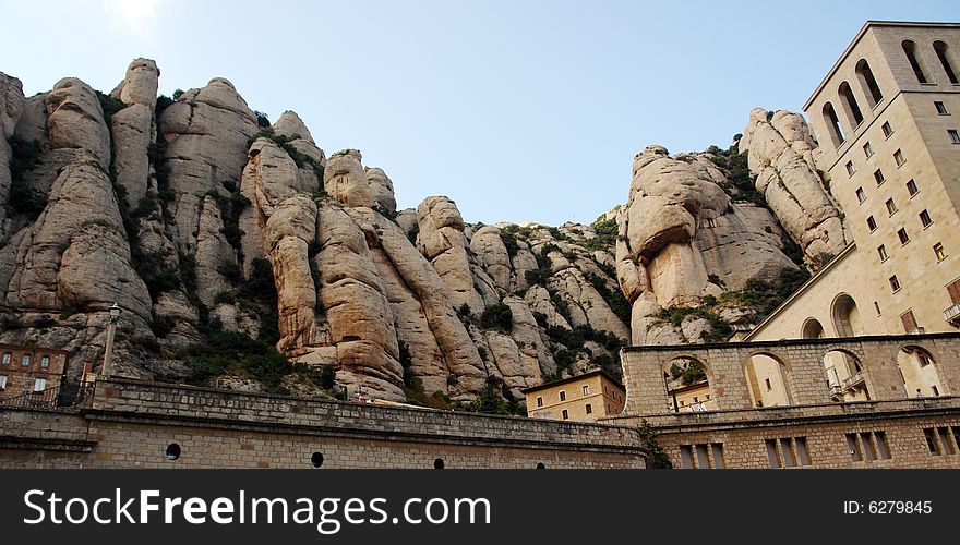 Rock at Monastery Montserrat in Spain not so far of Barcelona . White-Blue Sky above .