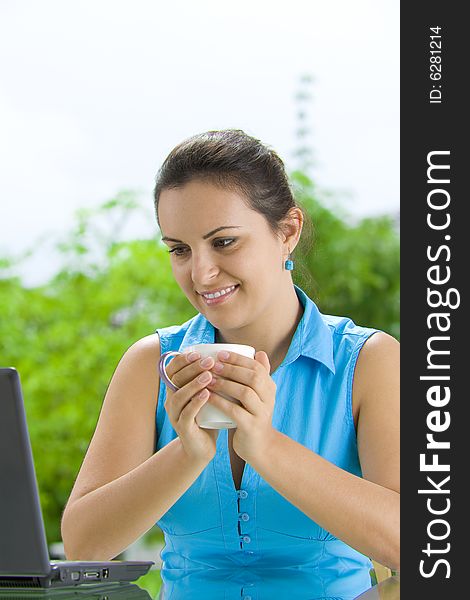 Portrait of young beautiful woman with her laptop. Portrait of young beautiful woman with her laptop