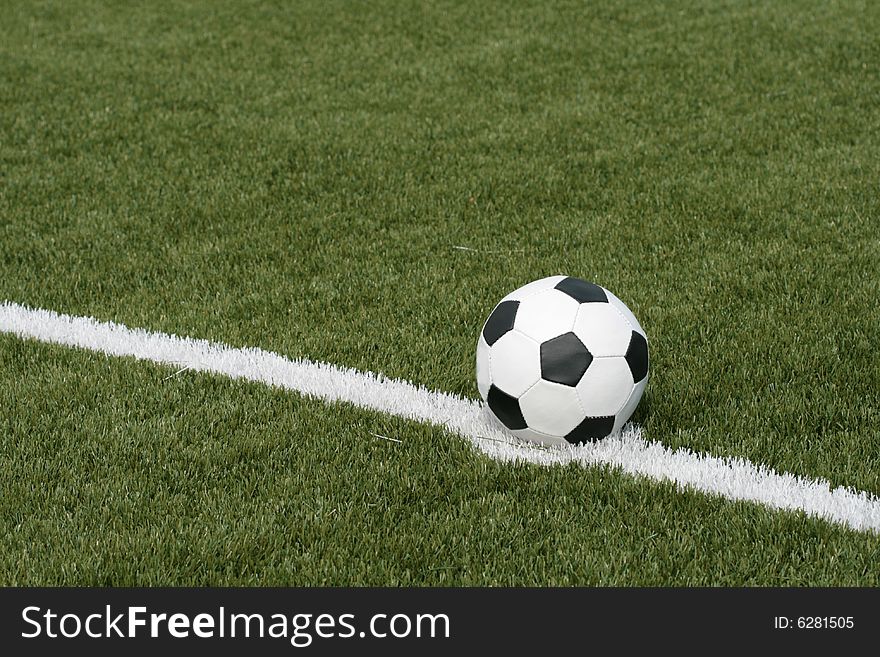 Football in stadium with an artificial covering before the beginning of game